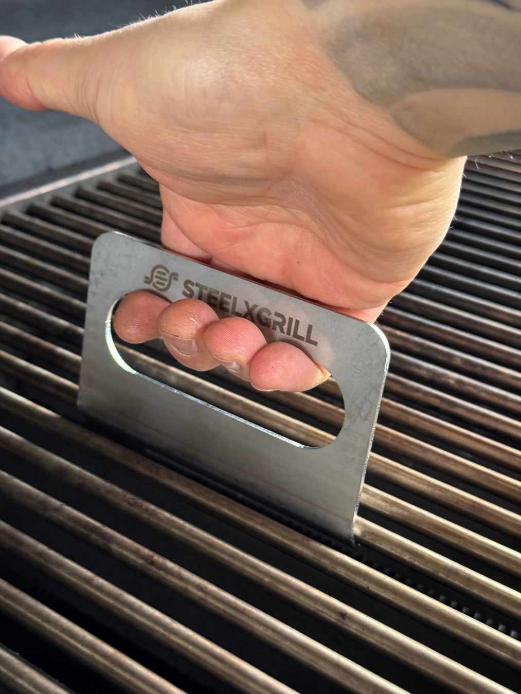 Maniglie (coppia) per alzare e spostare la griglia in acciaio per barbecue
